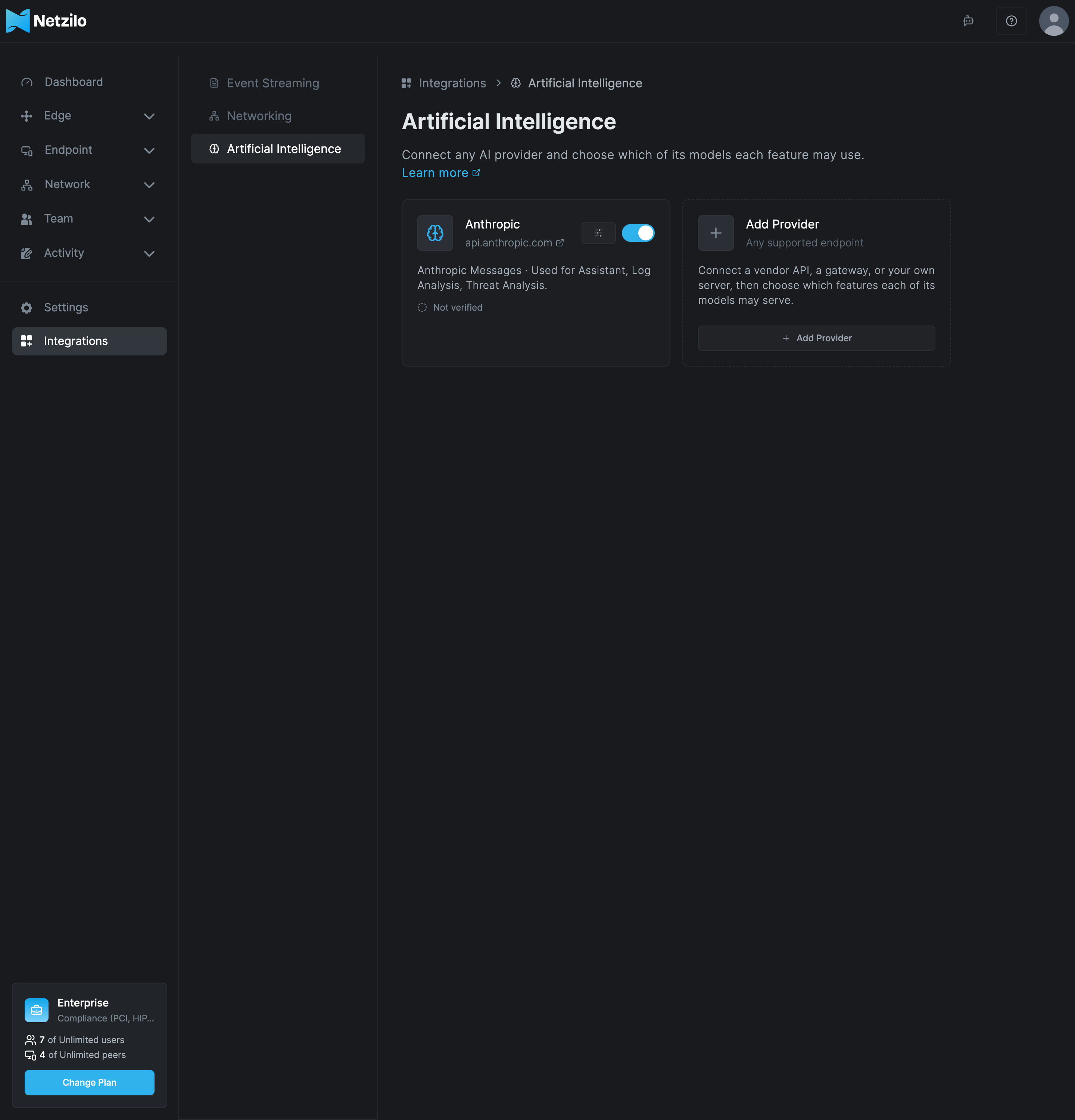 The Artificial Intelligence tab of Integrations, with one Anthropic provider card used for Assistant, Log Analysis and Threat Analysis, and the Add Provider card