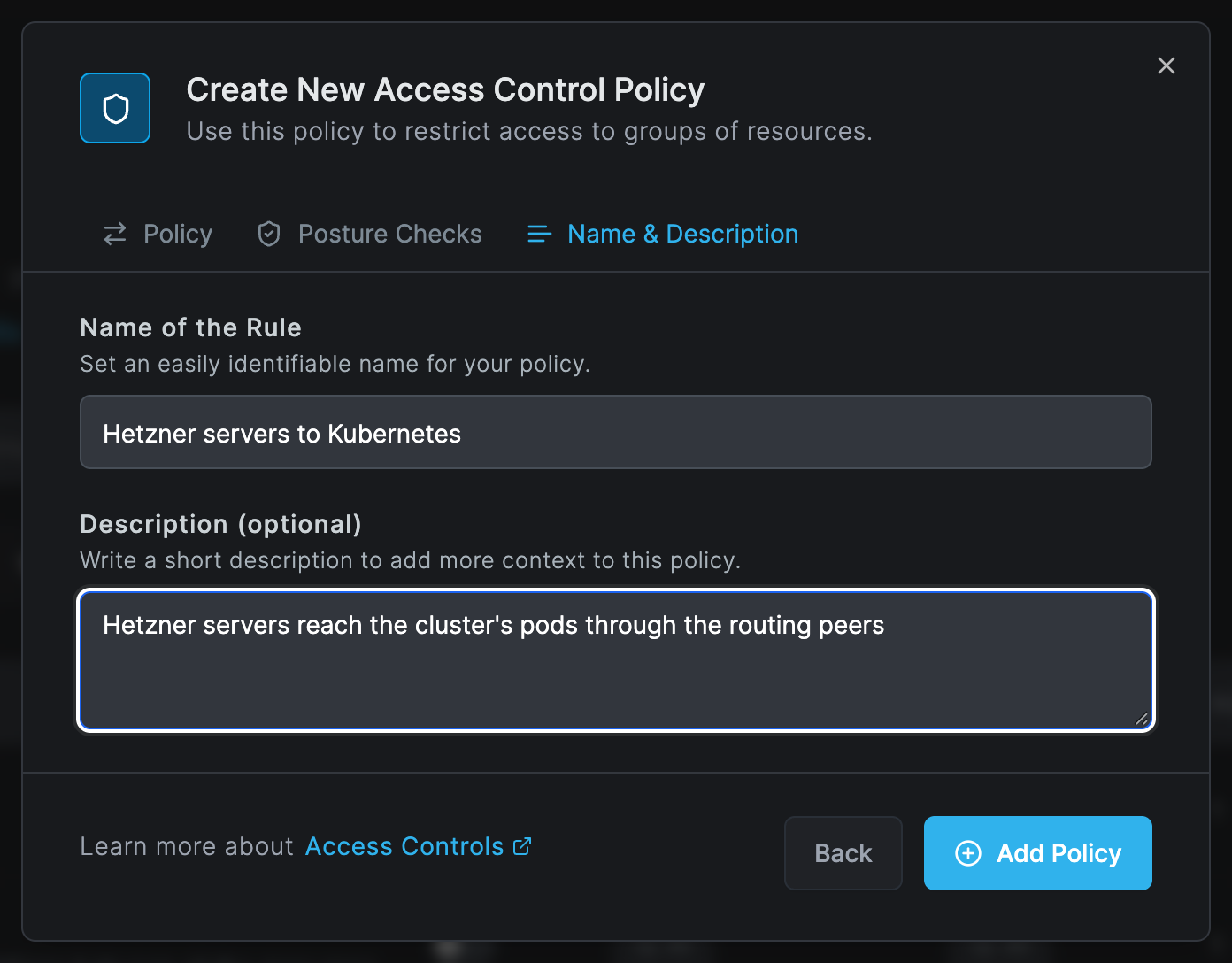 The Name & Description tab of the policy with the name Hetzner servers to Kubernetes and a short description